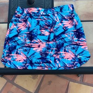 Blue, navy, and pink tennis skirt with shorts